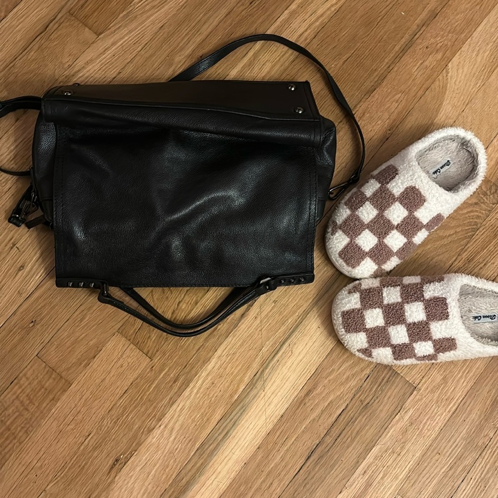 Black shoulder bag with studded accents